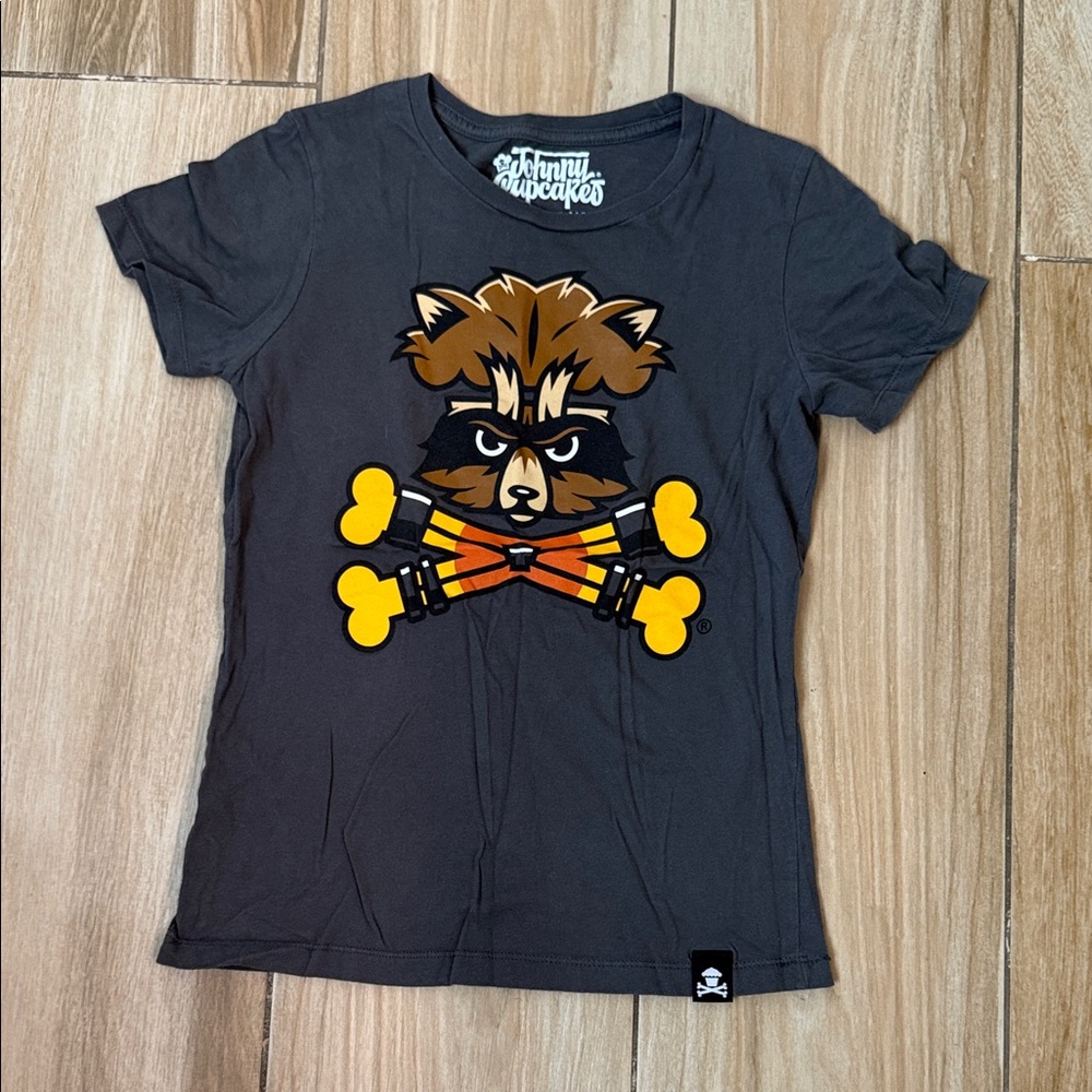 Johnny Cupcakes Gray Tee with Raccoon and Crossbones Design